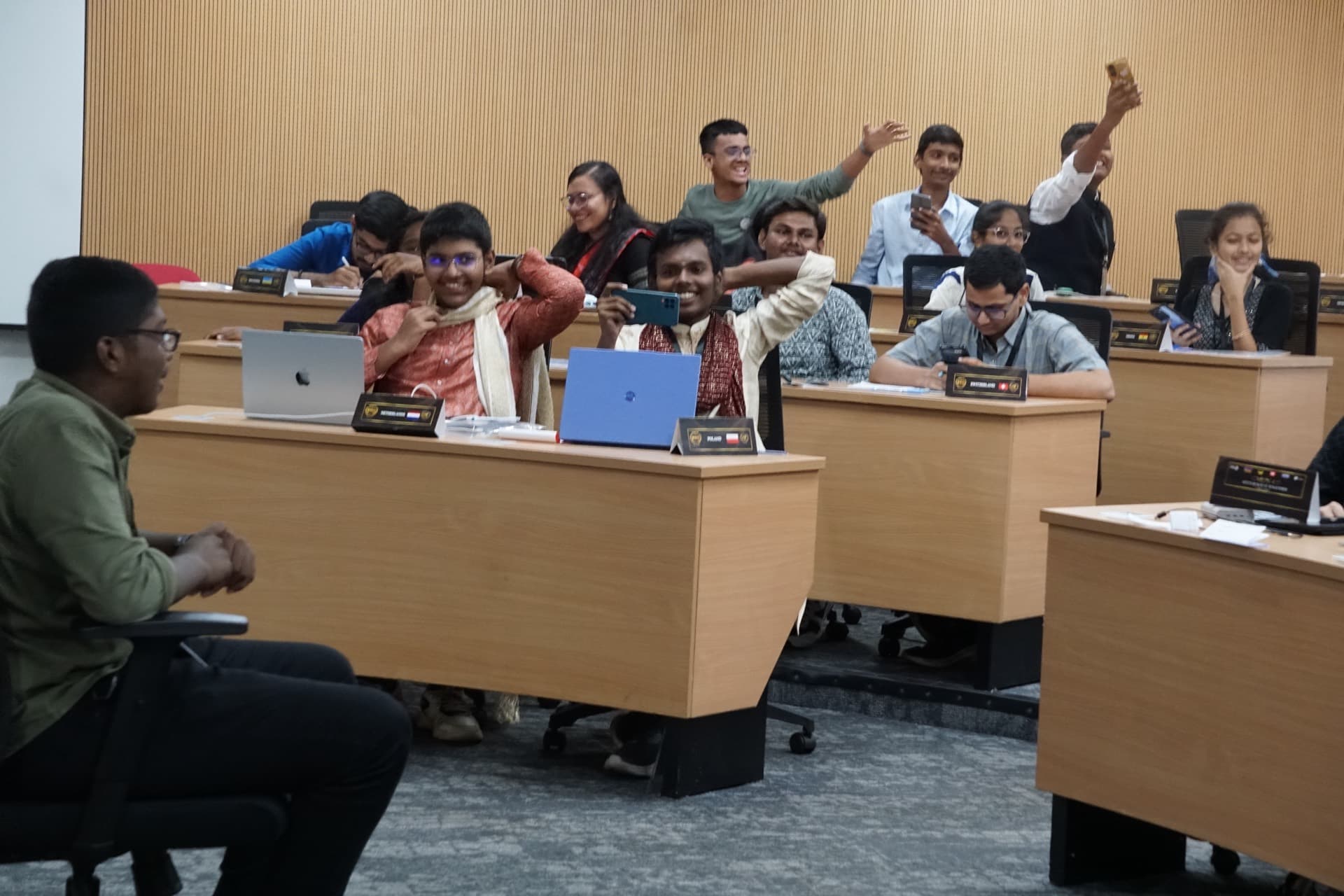 Delegates raising placards during a committee session