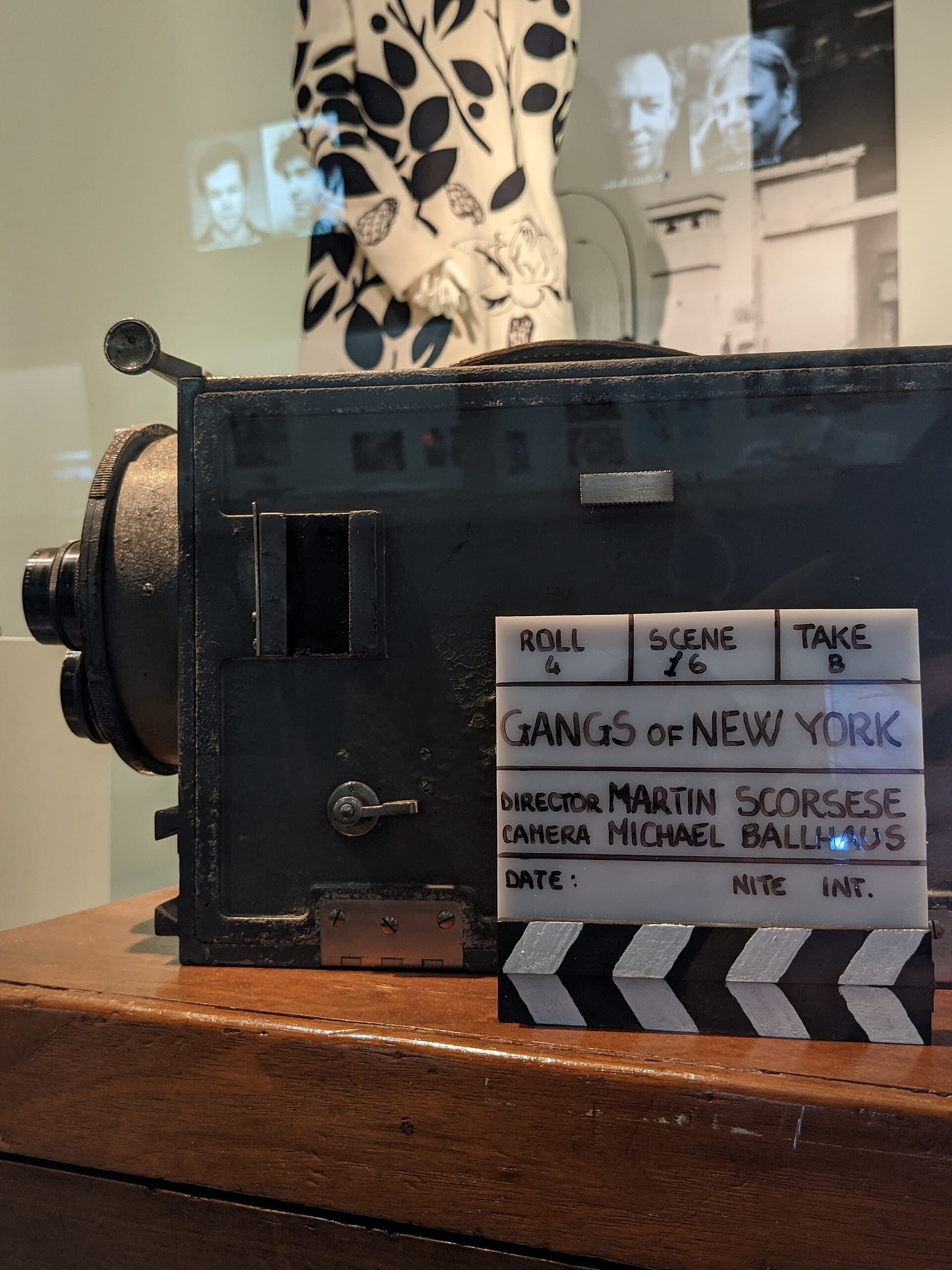 A vintage film camera and clapperboard