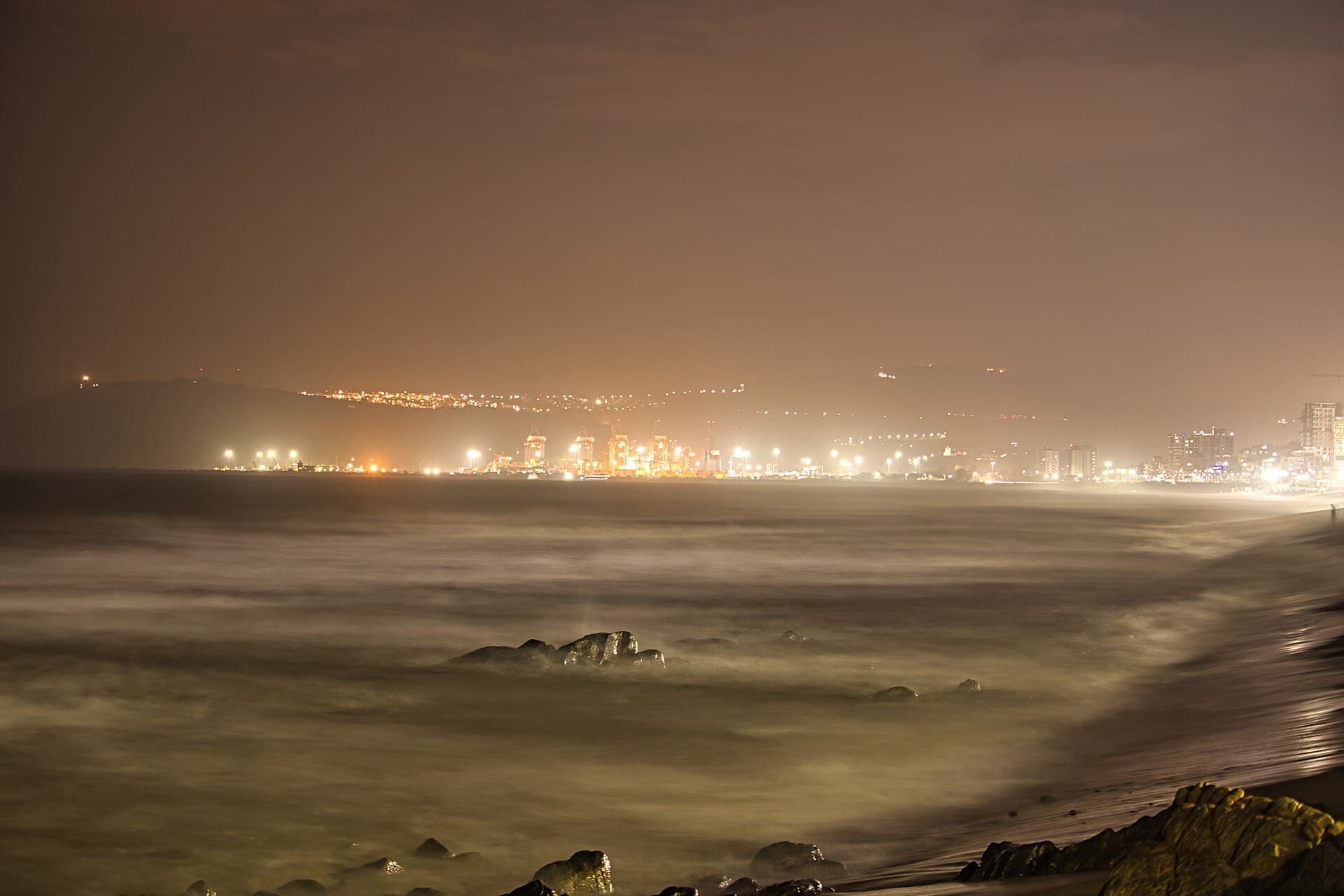 The lights of Visakhapatnam port seen from RK Beach at night